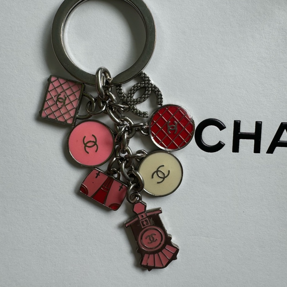 Chanel keychain train luggage pink red white